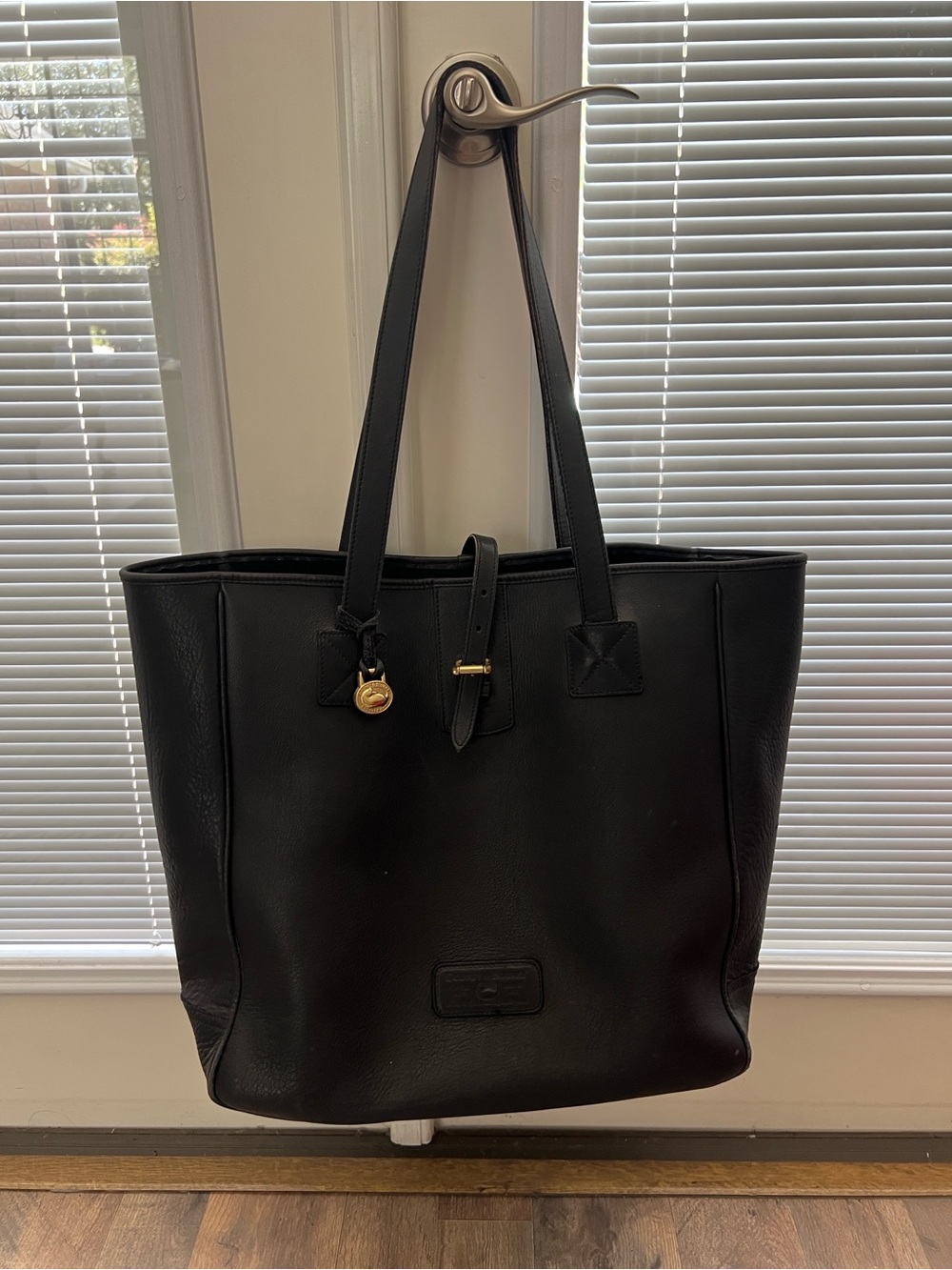 Vintage Dooney and Bourke oversized black leather tote. GUC